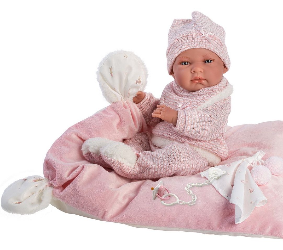 Llorens beba Nika sa roze jastukom